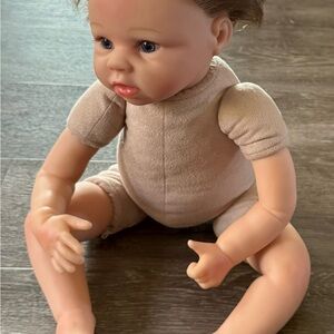 Realistic baby doll